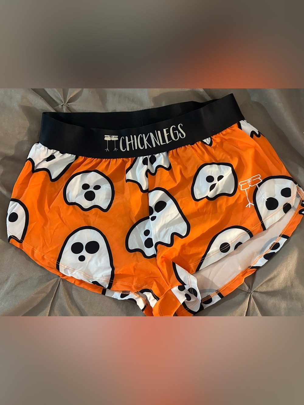ChicknLegs Women's Orange Ghost Print Athletic Shorts